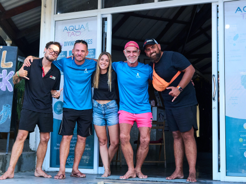 AquaTao team in front of the dive shop