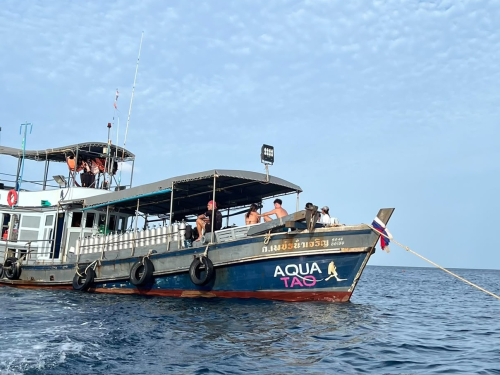 The AquaTao boat moored to a buoy